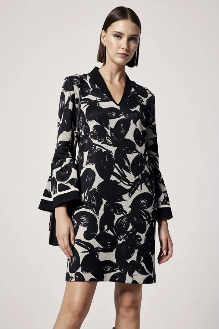 vestido_mujer_corto_con_m_0.webp Lopezientos Vestido mujer corto con manga farol estampado ⋆ Negro Best