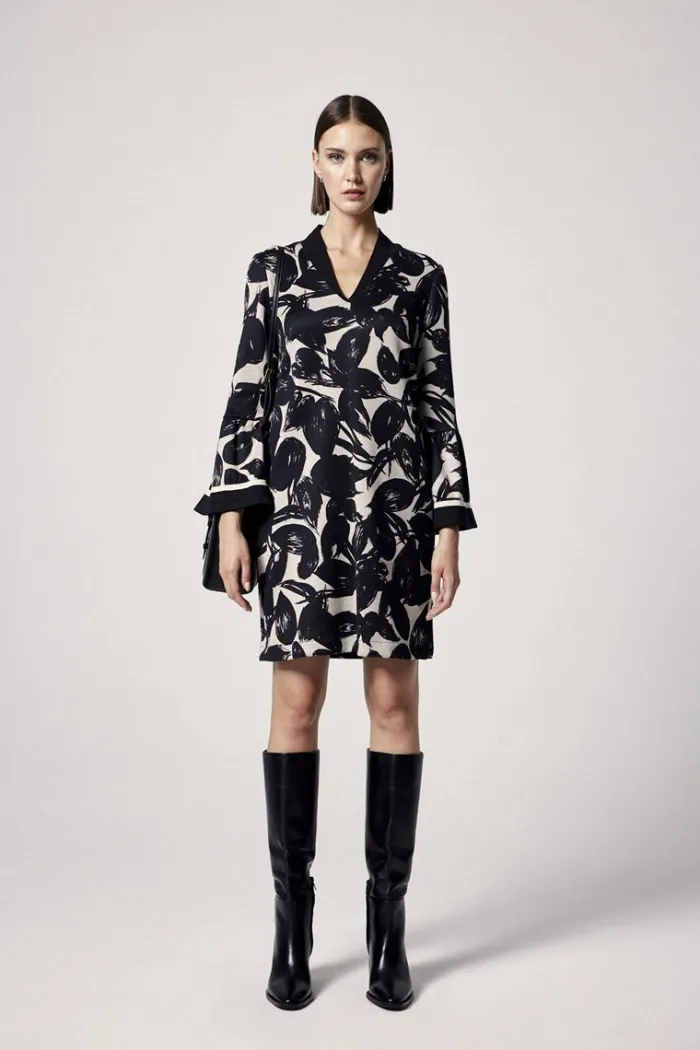 vestido_mujer_corto_con_m_2.webp Lopezientos Vestido mujer corto con manga farol estampado ⋆ Negro Best